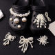 Cross-border hole shoes accessories high sense pearl chain shoe buckle women tassel bow shoe flower pearl jewelry wholesale