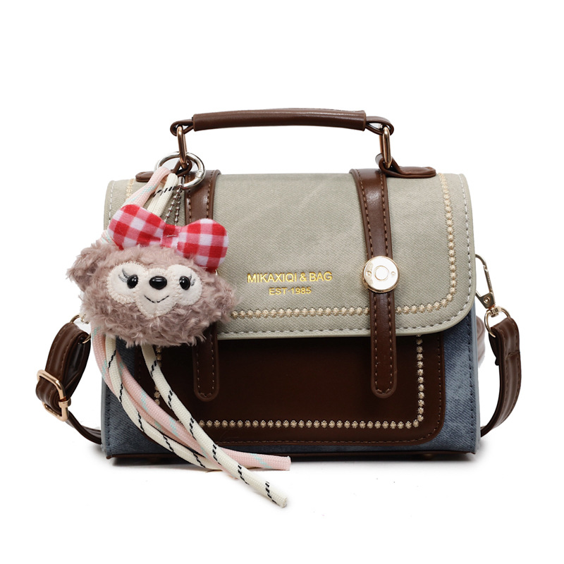 Bolso de mano doble estilo inglés de estilo extranjero 2025, otoño y invierno nuevo estilo de bolso de mujer relajado, bolso de hombro casual.