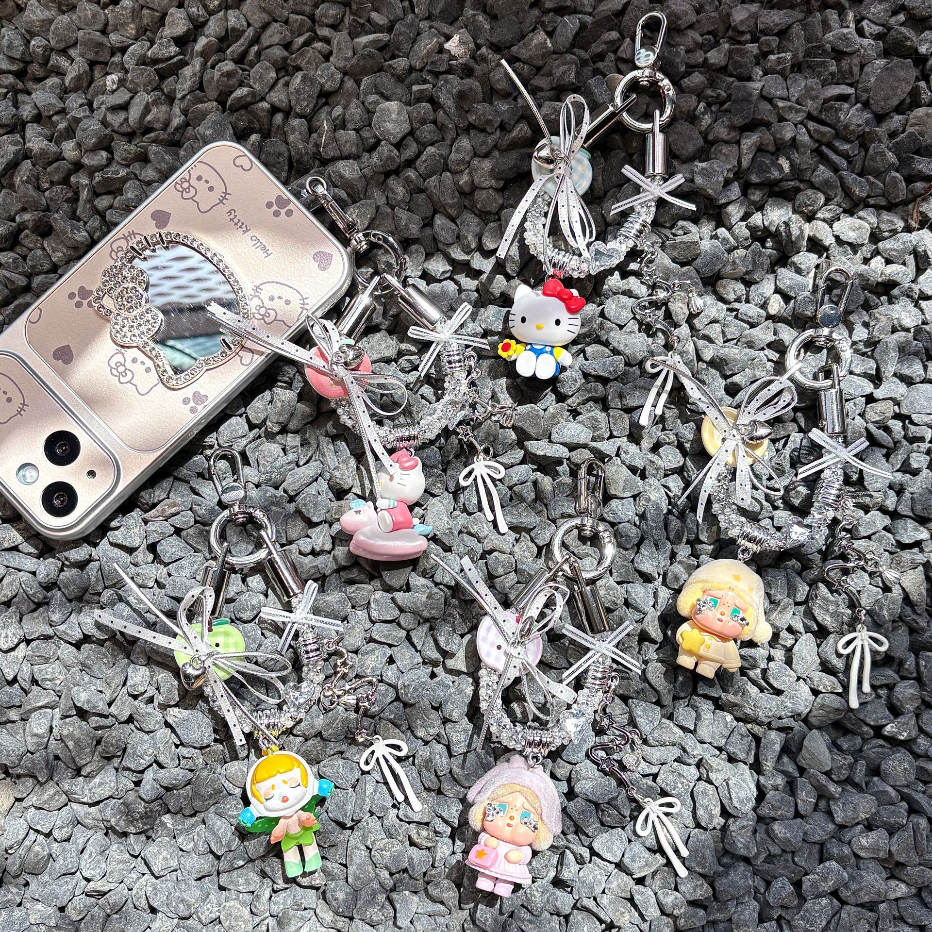 New phone chain accessory with sparkling rhinestone bow, anti-lost pendant, sweet and cool girl phone strap with horn studs