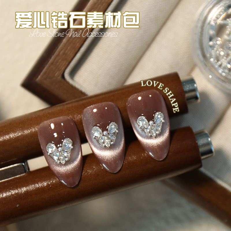 Nuevo taladro de uñas de amor en línea super flash gota de agua plana amor material de collage paquete de uñas decoración al por mayor