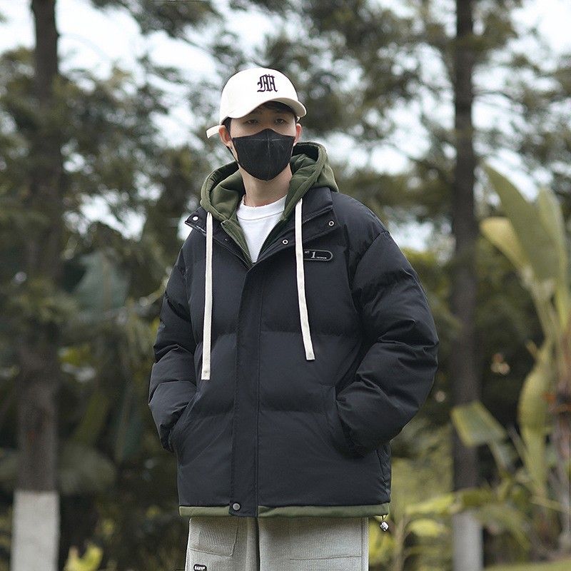 Falsa de dos piezas de algodón chaqueta de invierno para niños con capuchón grueso a prueba de frío y calentamiento de pan chaqueta de algodón casual transfronteriza