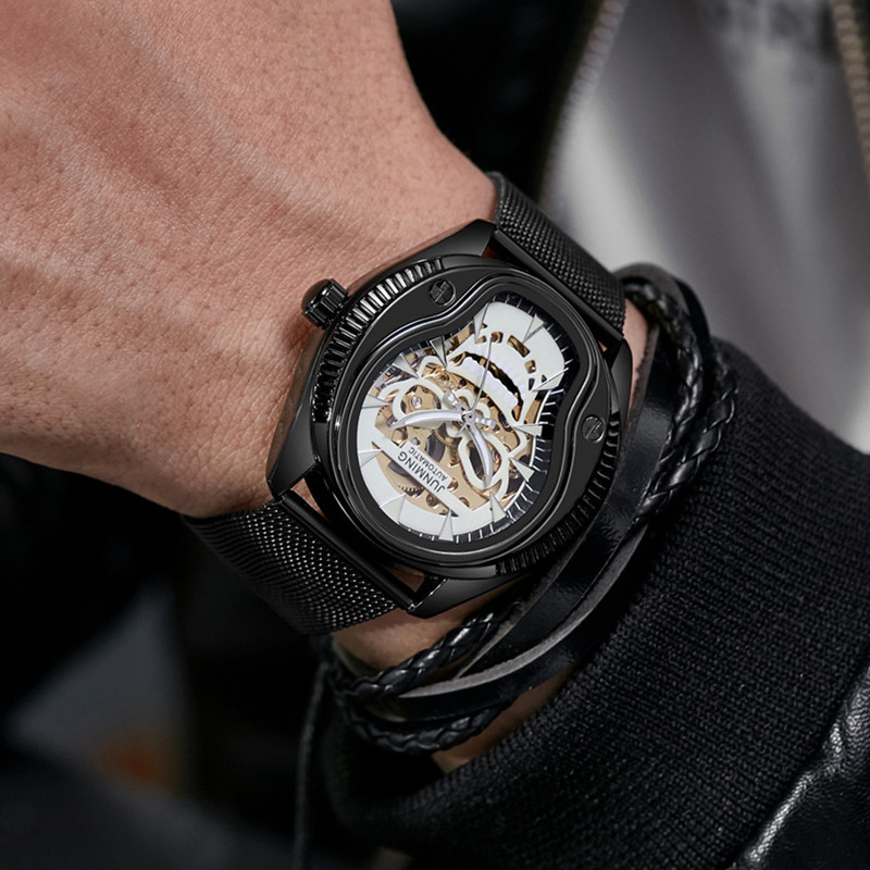 JUNMING reloj de la marca de los hombres Swiss cross-border caliente hueco cráneo tendencia de la moda reloj mecánico automático