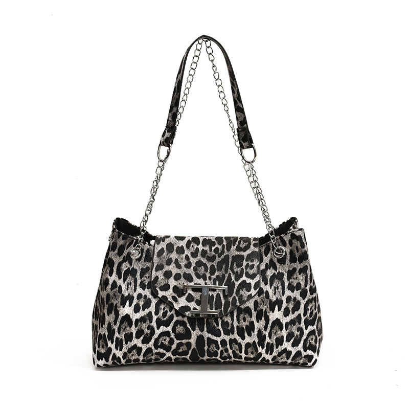 Este año, la popularidad de la bolsa de gran capacidad de leopardo para mujeres 2024 nuevo otoño versátil mochila de viaje bolsa de cadena de hombro