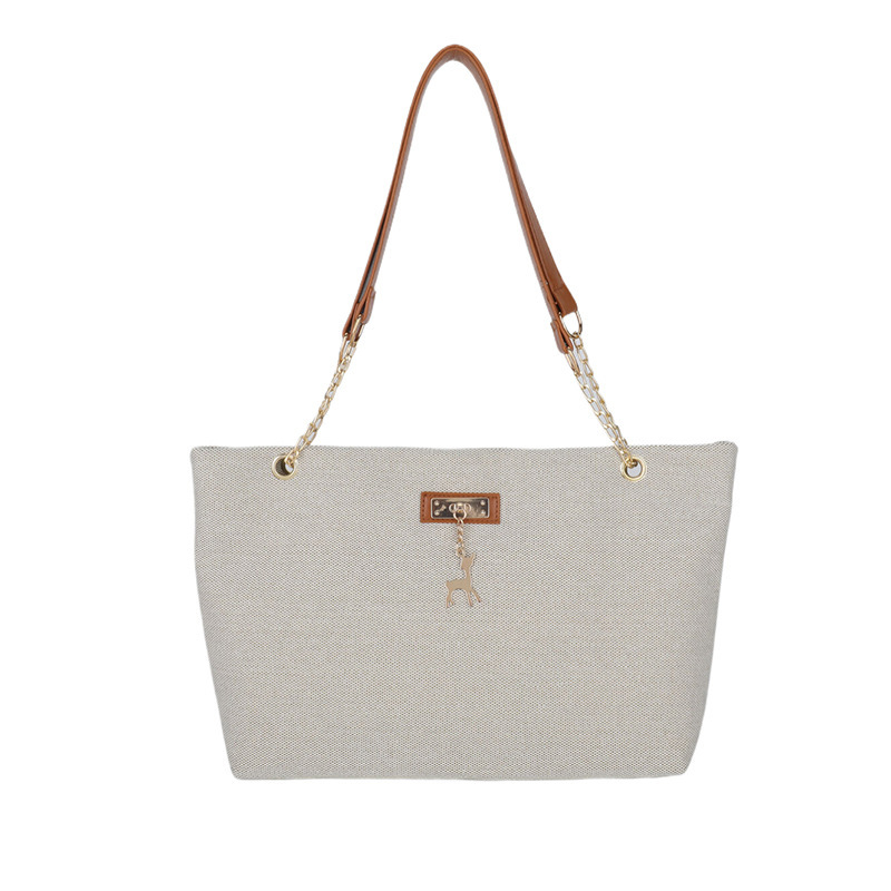 Textura simple, bolso de hombro versátil 2024 nueva moda moda de gran capacidad, bolso de transporte ligero, bolso de brazo