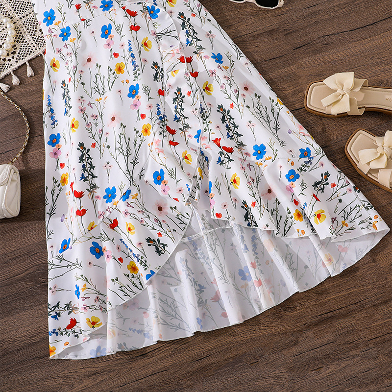 Primavera y verano de ropa de niñas europeas y estadounidenses, nuevo temperamento elegante borde de loto irregular vestido de impresión de cinturón