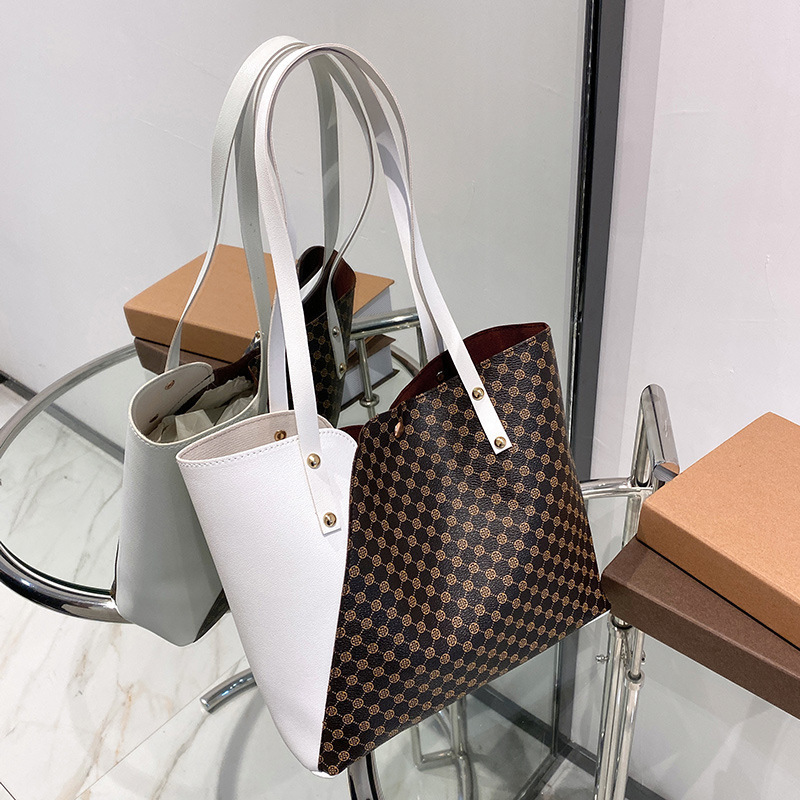Bolsas de mujer al por mayor de comercio exterior 2023 nueva moda bolsas de hombro de moda personalidad bolsas de tote de color una bolsa transfronteriza
