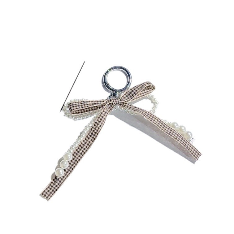 Coreano estricto color curry cinta arco perla bolsos bolsos llavero de encaje dulce bolsos colgantes pequeños vientos fragrantes