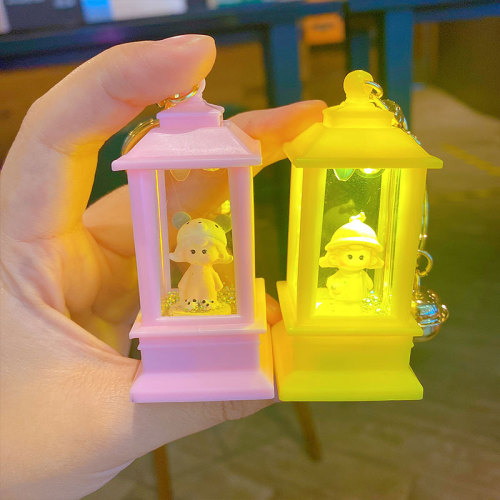Creative sand bottle flash light keychain pendant cute cartoon small tower lantern night light for students school backpack small ornament wholesale
