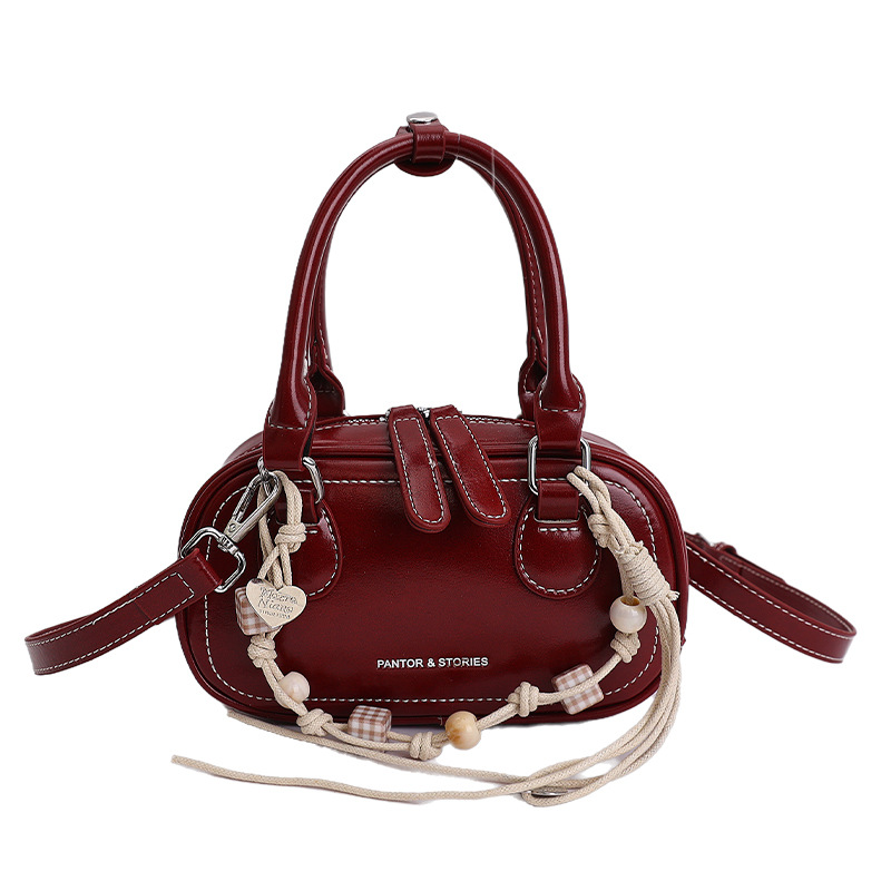 Bolsa de hombro coreana de diseño de nicho simple 2026 nueva moda femenina de tendencia diaria textura de viaje popular bolso de hombro