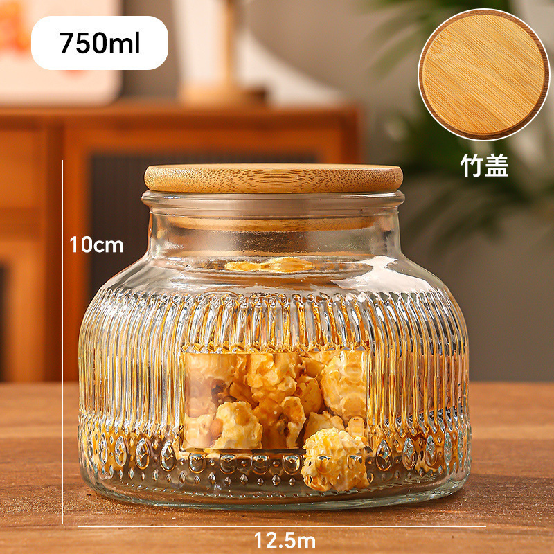 Relieve gran barriga tanque de almacenamiento de vidrio sellado cocina frutas secas granos alimentos almacenamiento al por mayor latas de dulces transparentes