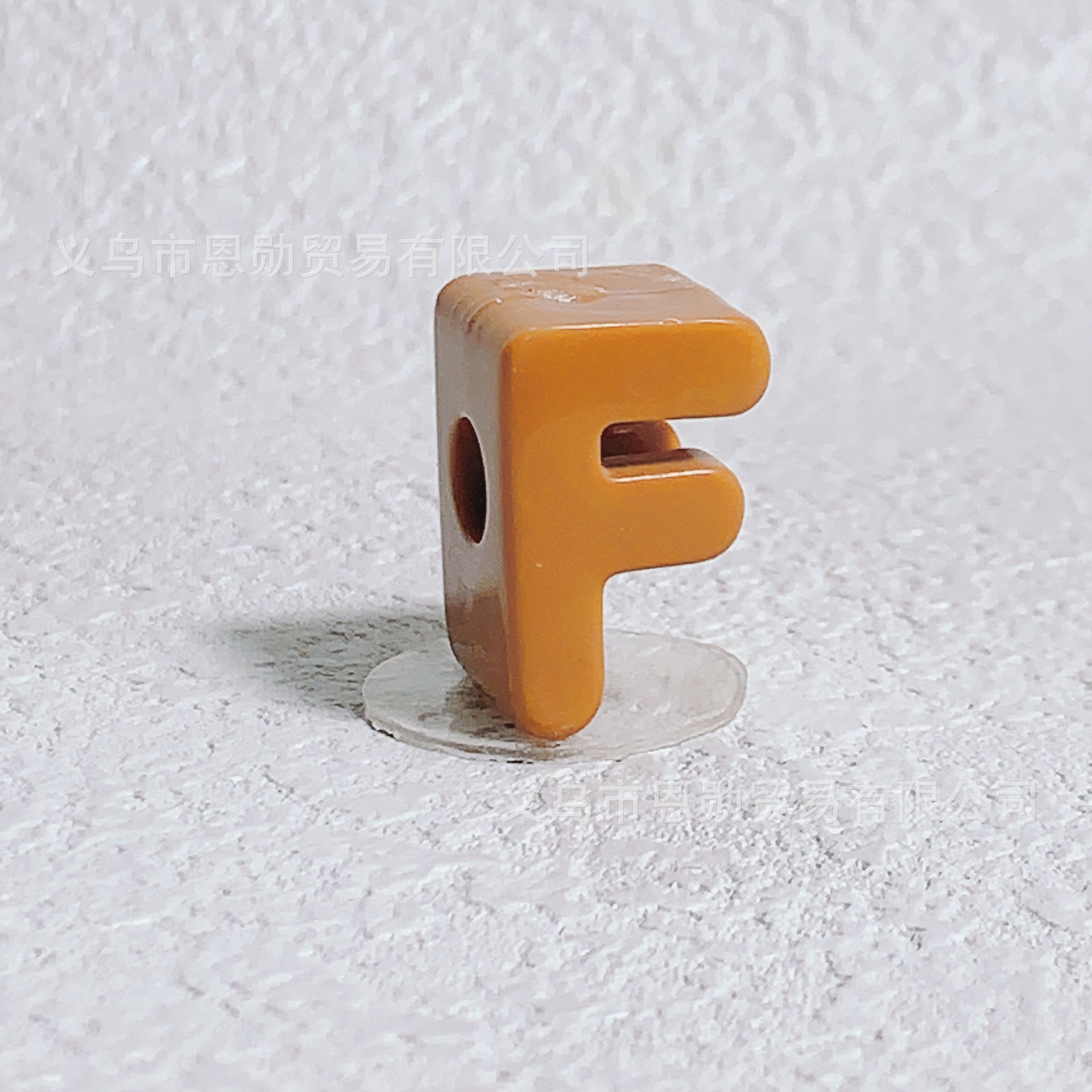 F (Brown)