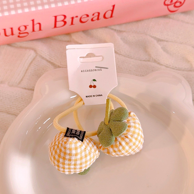 노란색 격자 딸기 2개