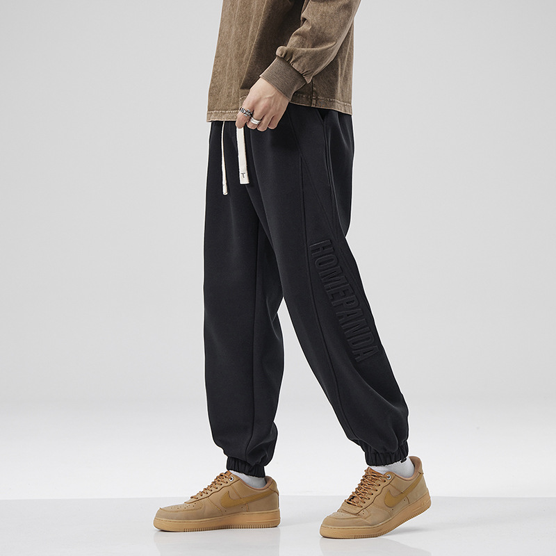 2025 otoño y invierno pantalones negros de pie pantalones deportivos largos lar