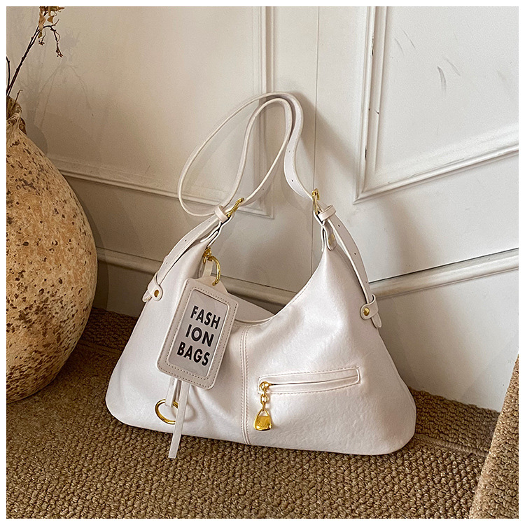 Bolsas retro de gran capacidad para mujeres 2026 nuevo estilo coreano de ocio de hombro con bolsas de brazalete inclinadas para viajar bolsas de mano simples
