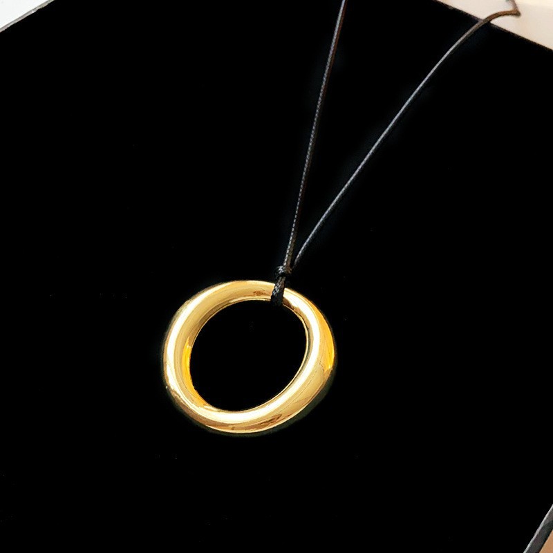 Nuevo estilo de cuero chino, colgante, collar de borlas, estilo étnico femenino, cadena de suéter retro de nicho, moda, artículos de alta gama