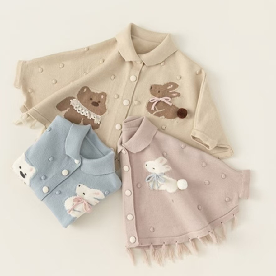 Casaco de malha para menina com capuz e borlas de bebé_voghion.com