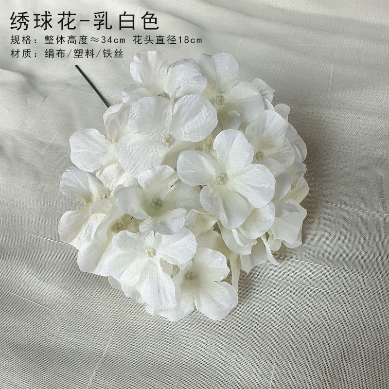 Milky white hydrangea head with rod (not inserted)