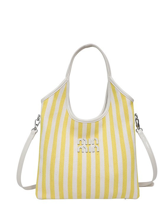 Bolsa de hombro a rayas de lona 2026 nueva sensación de lujo ligera casual diaria gran capacidad mochila