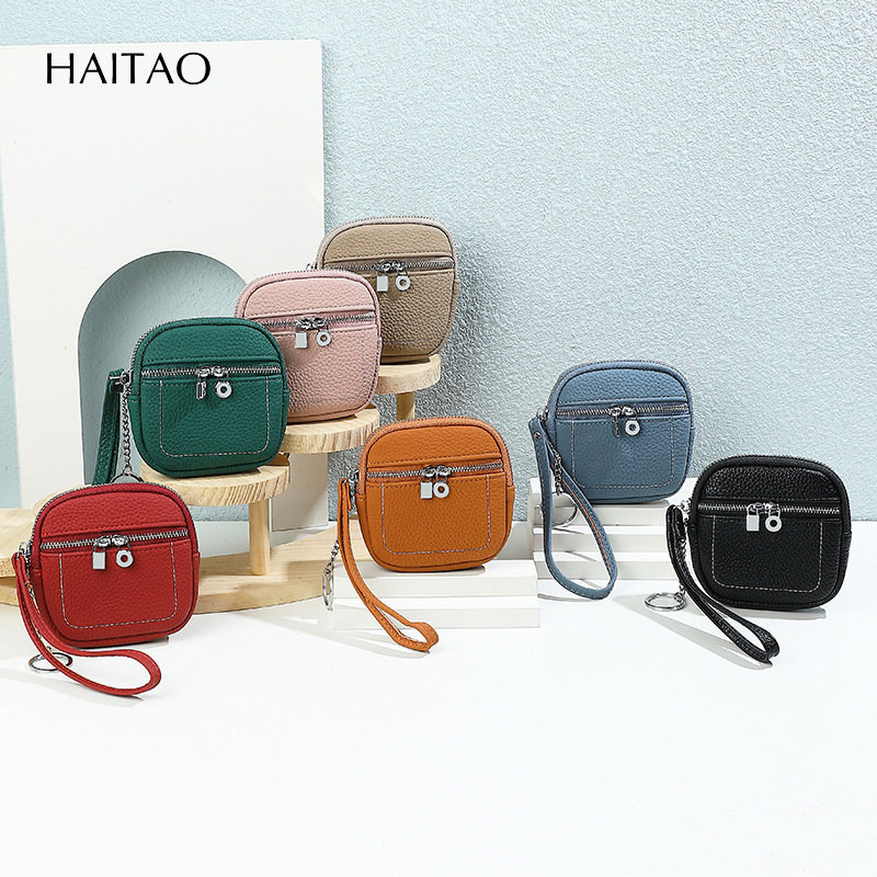 Nuevo lindo bolso de cambio de mano multifuncional simple sensación de alto nivel de doble cremallera lápiz labial bolso de tarjeta pequeña cartera