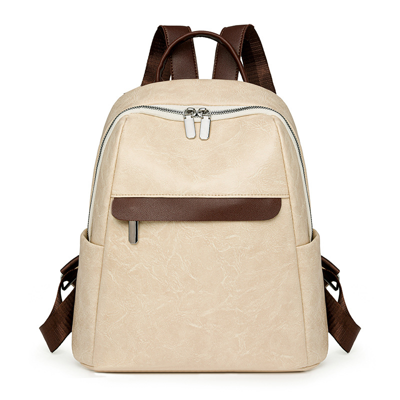 Mochila casual de cercanías 2024 nueva moda simple de gran capacidad para salir bolso de mujer de todo fósforo bolso de estudiante de cuero suave