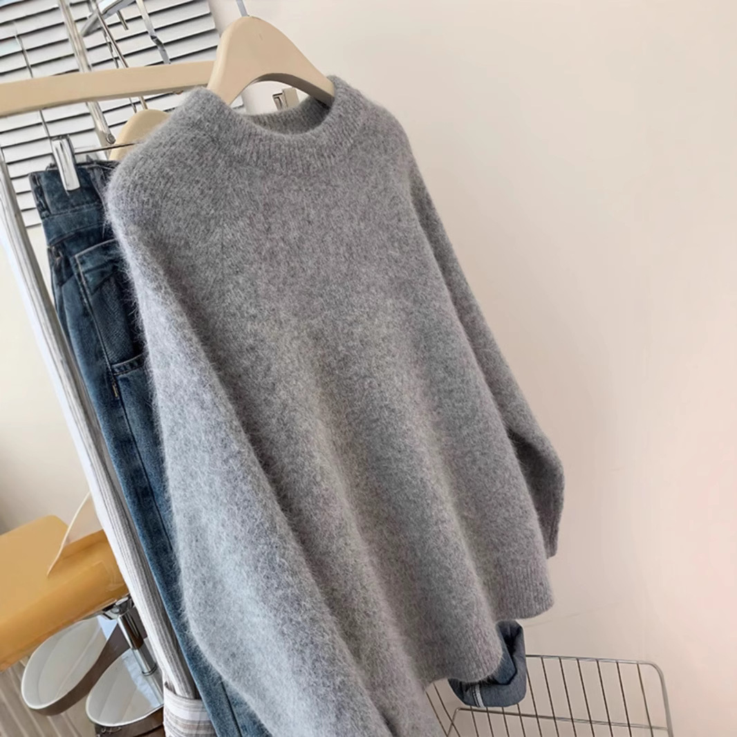 ヨーロッパの商品100純ウールのセーターの女性2025年の冬のピンクの肩のカシミヤはゆったりとしています。