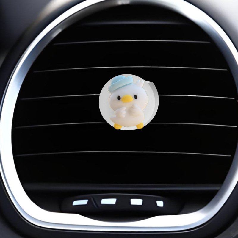 Clip de salida de aire de coche pequeño pato amarillo resina aromaterapia de coche perfume de coche adornos de dibujos animados accesorios de decoración suministros de coche
