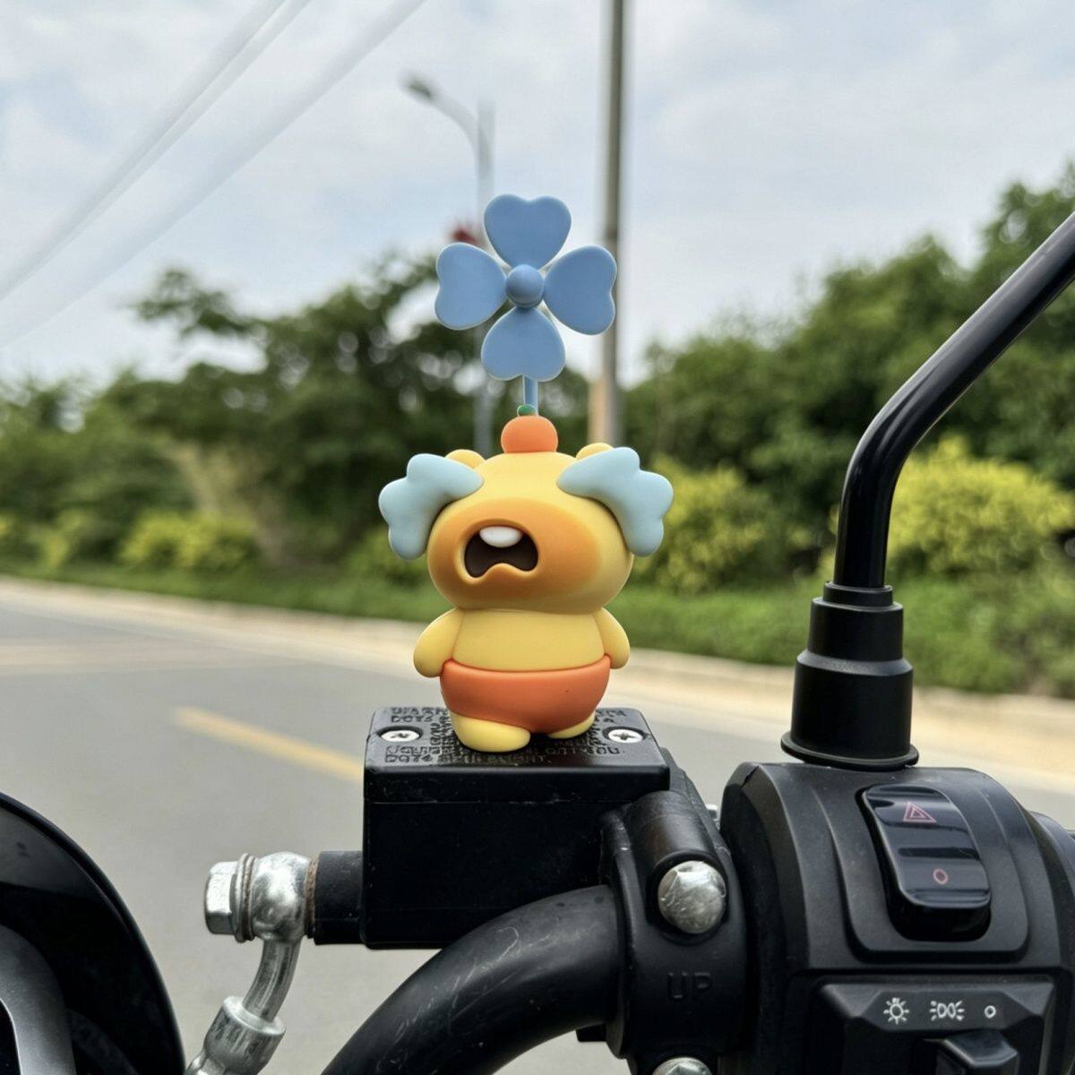 Electric vehicle decoration capybara Lulu rotating windmill, universal cute decorative toy pendant for bicycles and motorcycles