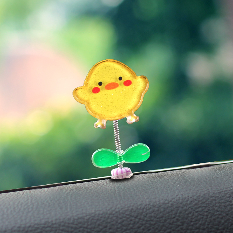 Adornos pequeños de dibujos animados lindos, decoraciones interiores de automóviles, adornos de automóviles, autos eléctricos, muñecas que sacuden la cabeza, descompresión de escritorio, celebridades de Internet