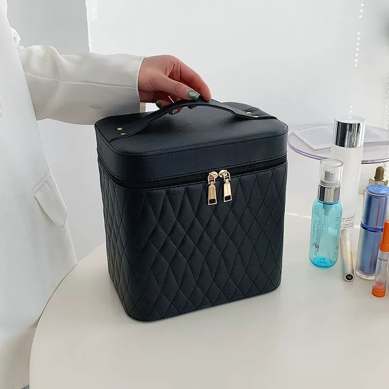 Capacious handheld cosmetic bag for traveling, storage box