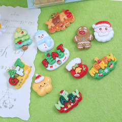 漫画のクリスマスシリーズの字のブランドの樹脂の装飾品の付属品のクリームのゴムのdiyの髪のひものヘアピンの穴の靴の装飾品の小振り