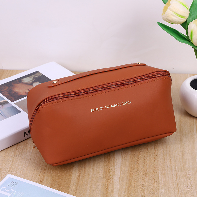 PU almohada bolsa de cosméticos portátil de viaje de gran capacidad bolsa de lavado de cosméticos de escritorio bolsa de almacenamiento de embalaje al por mayor