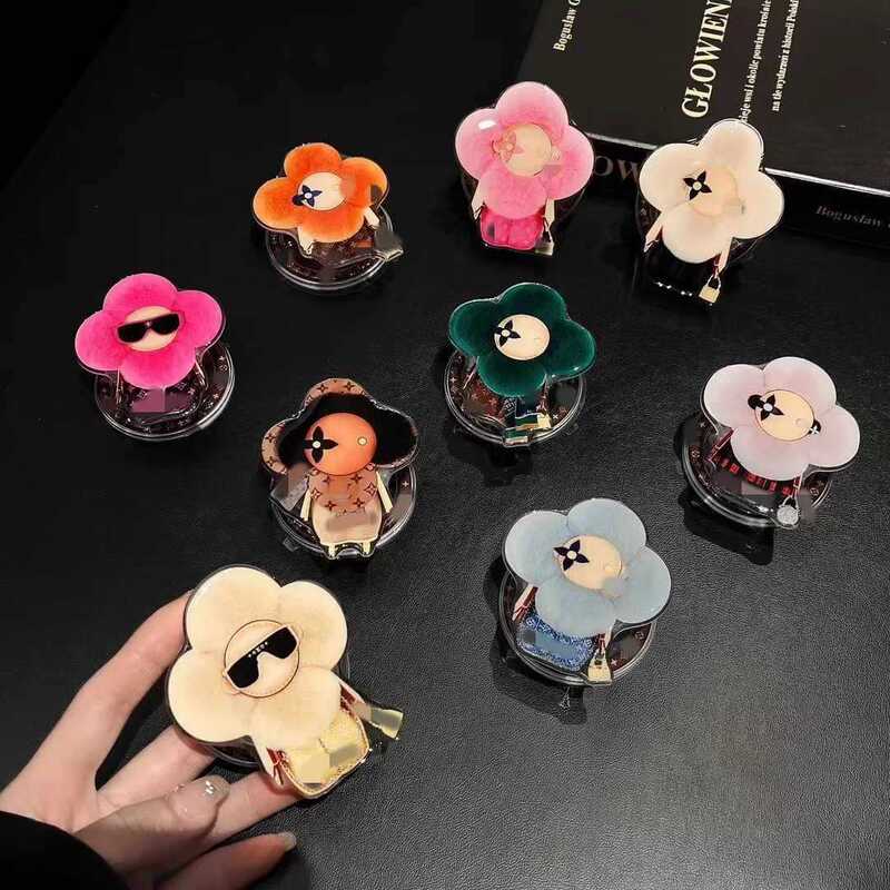 New Advanced Magnetic Bracket Magnetic Mobile Phone Case Universal Sunflower Magnetic Airbag Bracket Fashionable Good-looking Luxury