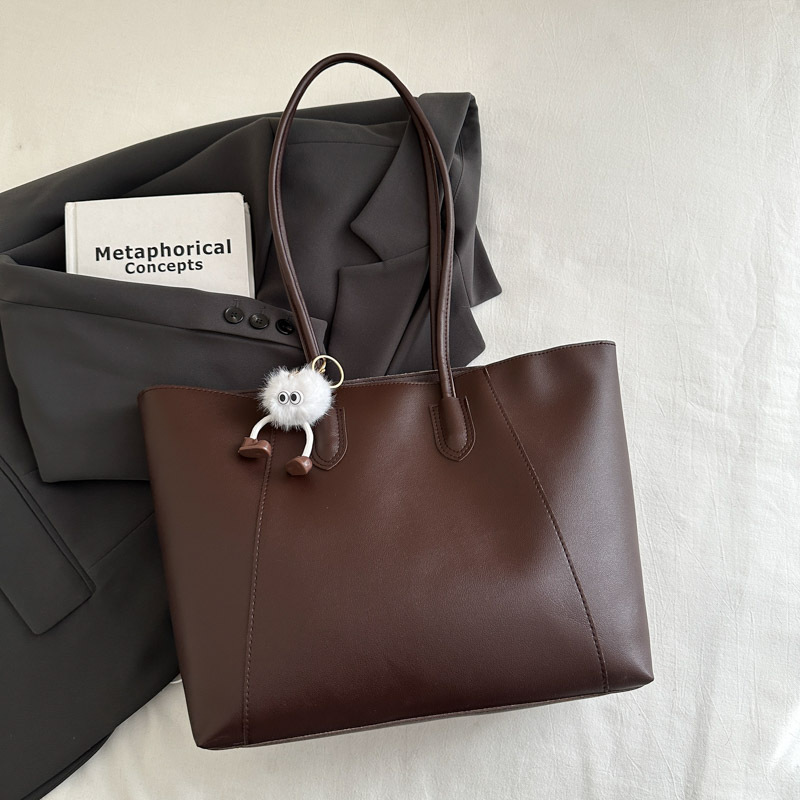 Bolsa de mano de textura de viaje casual otoño / invierno 2024 nuevo estilo coreano simple bolso de hombro axilar temperamento bolso especial