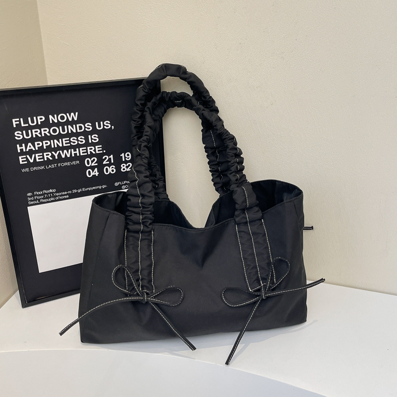 Bolsos de arco de textura de alta calidad, bolsas de nylon de alta capacidad, damas 2025, bolsas de moda, bolsas de nylon casuales de gran capacidad