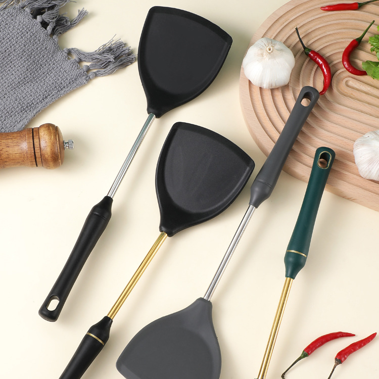 Acero inoxidable espátula de silicona resistente a altas temperaturas espátula de silicona antiadherente hogar sartén especial espátula de silicona suministro directo de fábrica al por mayor