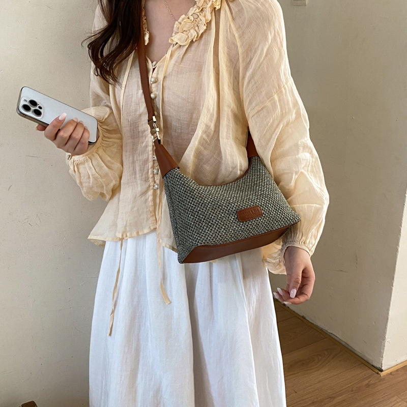 2026 verano nuevo estilo de moda bolsa de paja portátil diaria bolsas de bolsas