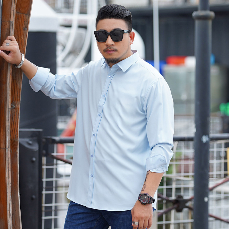 卸売りの現物の大きいサイズの男性服のカジュアルなシャツの夏の男性のビジネスはゆったりしていて、大きいサイズの純色の長袖のシャツをプラスします。|undefined