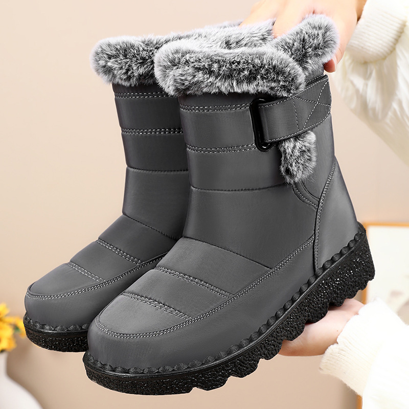 Botas de nieve de invierno para mujeres nuevas zapatos de algodón de alta resistencia al frío de gran tamaño de comercio exterior y terciopelo grueso calentamiento al por mayor zapatos de algodón de ancianos