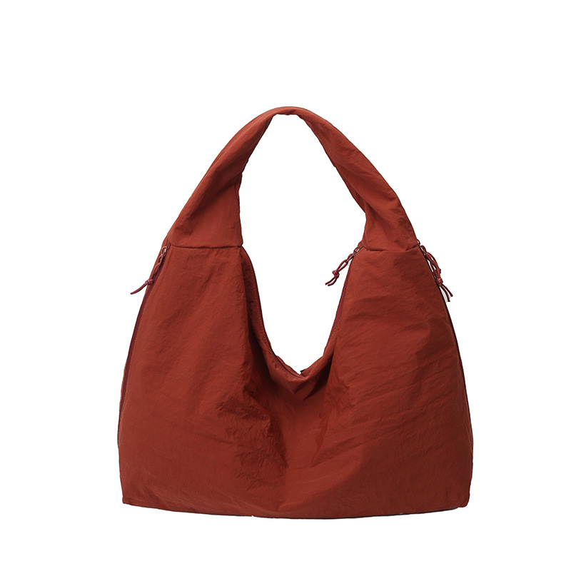 Bolso Tote de nylon popular transfronterizo 2025 verano nuevo estilo ins bolso de mujer de moda súper caliente bolso de viaje de temperamento de moda
