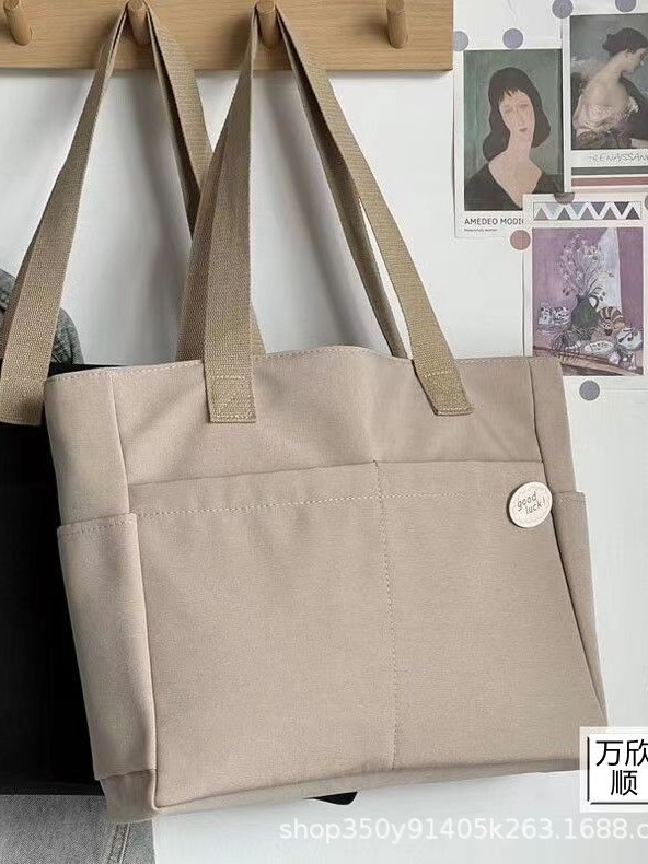 Diseño original bolso de tote de lona gruesa con cremallera japonesa para viajeros, bolso de hombro simple para estudiantes de arte informal