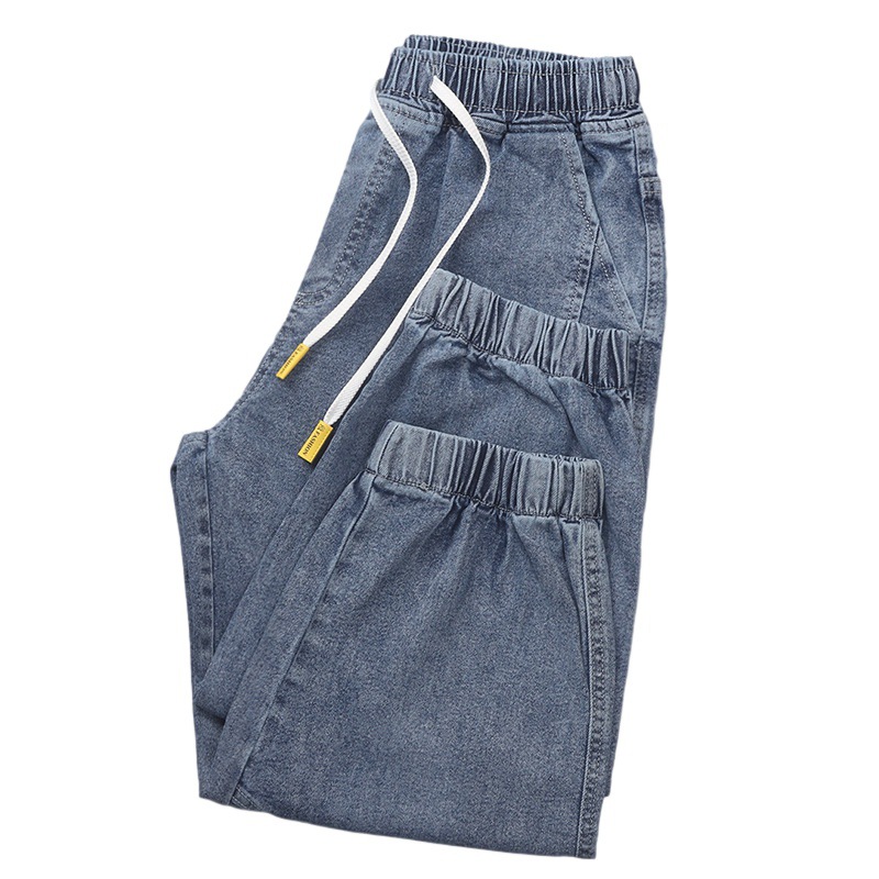 Comercio exterior cortar la etiqueta ropa de hombre suelta pie abrazado siete puntos jeans cintura elástica cuerda de dibujo de verano juvenil ocio pantalones harun moda