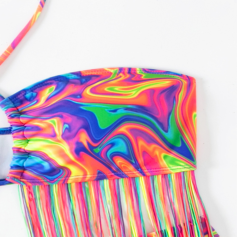 Side view of the fringe details on the swimsuit