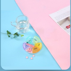 丸い虹の小さい薬の箱の携帯用の1週間の7日間の7格の携帯用の薬の箱の旅行の分格の薬品の収納の箱