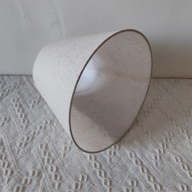 Amazon estilo americano pequeño redondo de hierro vaca esquina soporte lámpara de mesa accesorios pantalla cubierta de la cáscara redonda de lino sombreado de tela