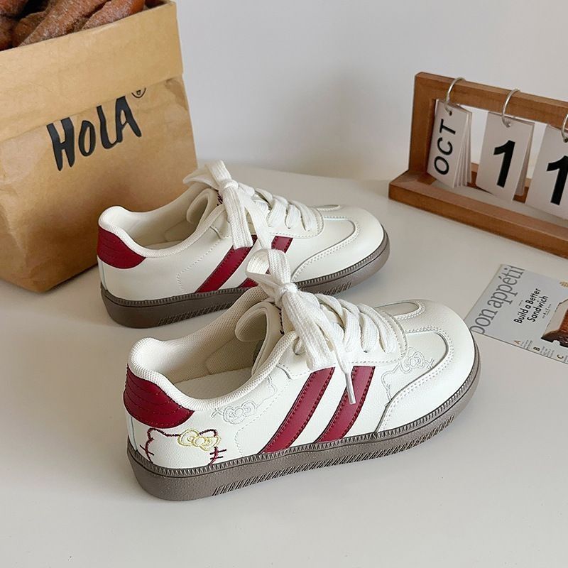 lindo KT gato bordado zapatos de entrenamiento de mujeres 2025 nuevo nicho casual chic zapatos de skate muñeca zapatos blancos pequeñas mujeres