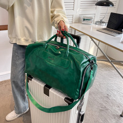 メーカー卸売りの新型韓国版pu手提げ旅行カバンフィットネス運動ヨガカバン大容量短距離荷物袋