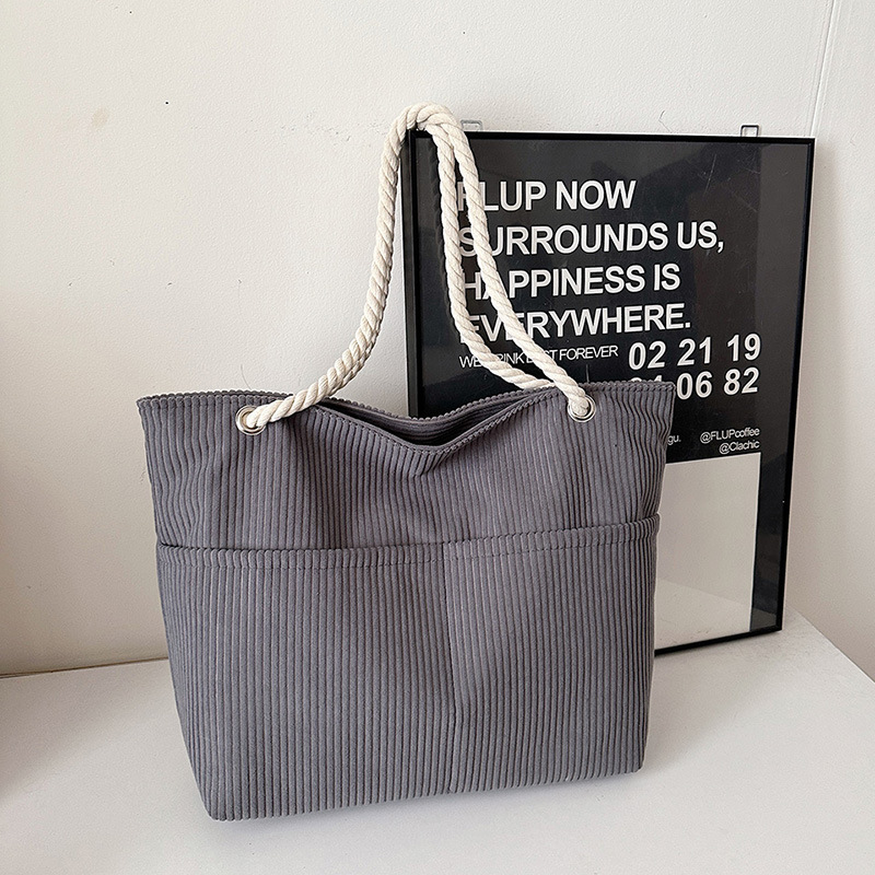 Otoño y invierno retro moda de gran capacidad de tela de cordillera 2024 nueva textura de bolso de hombro de mamá