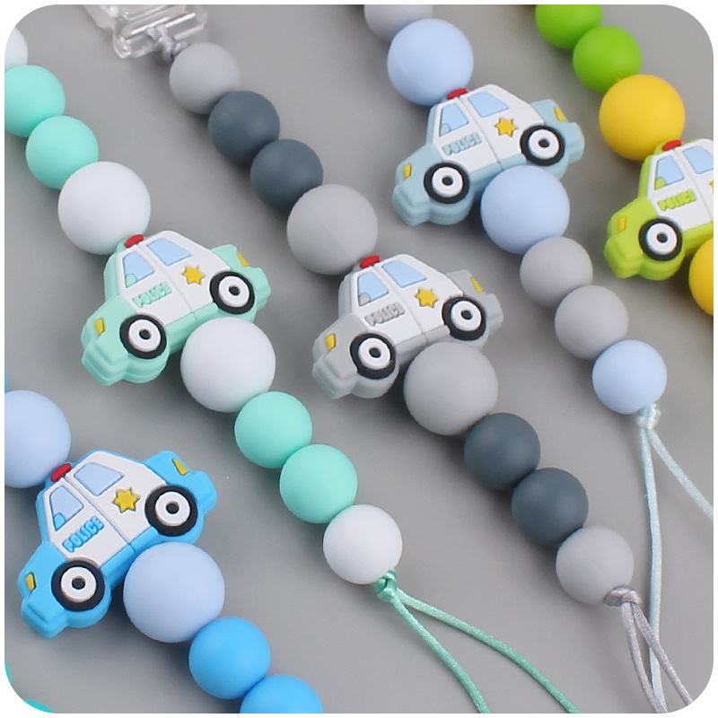 Nuevos suministros para bebés chupete cadena creativa DIY coche de policía silicona bebé mordedura molar anti-caída de la cadena