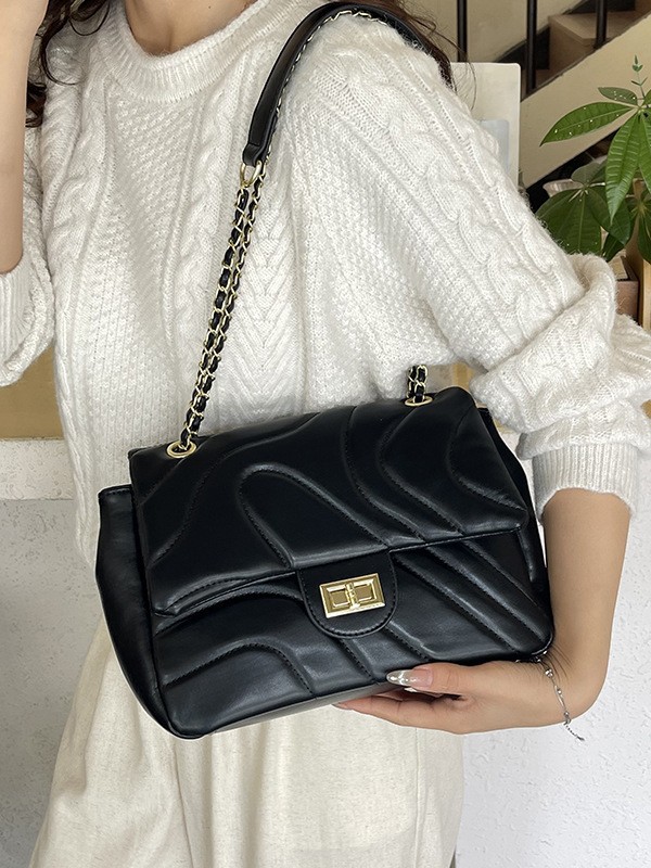 Bolso de cadena de comercio exterior para mujeres 2025, nueva moda bordada bolso de mano, sensación de alta calidad, simple ocio, mochila de viaje