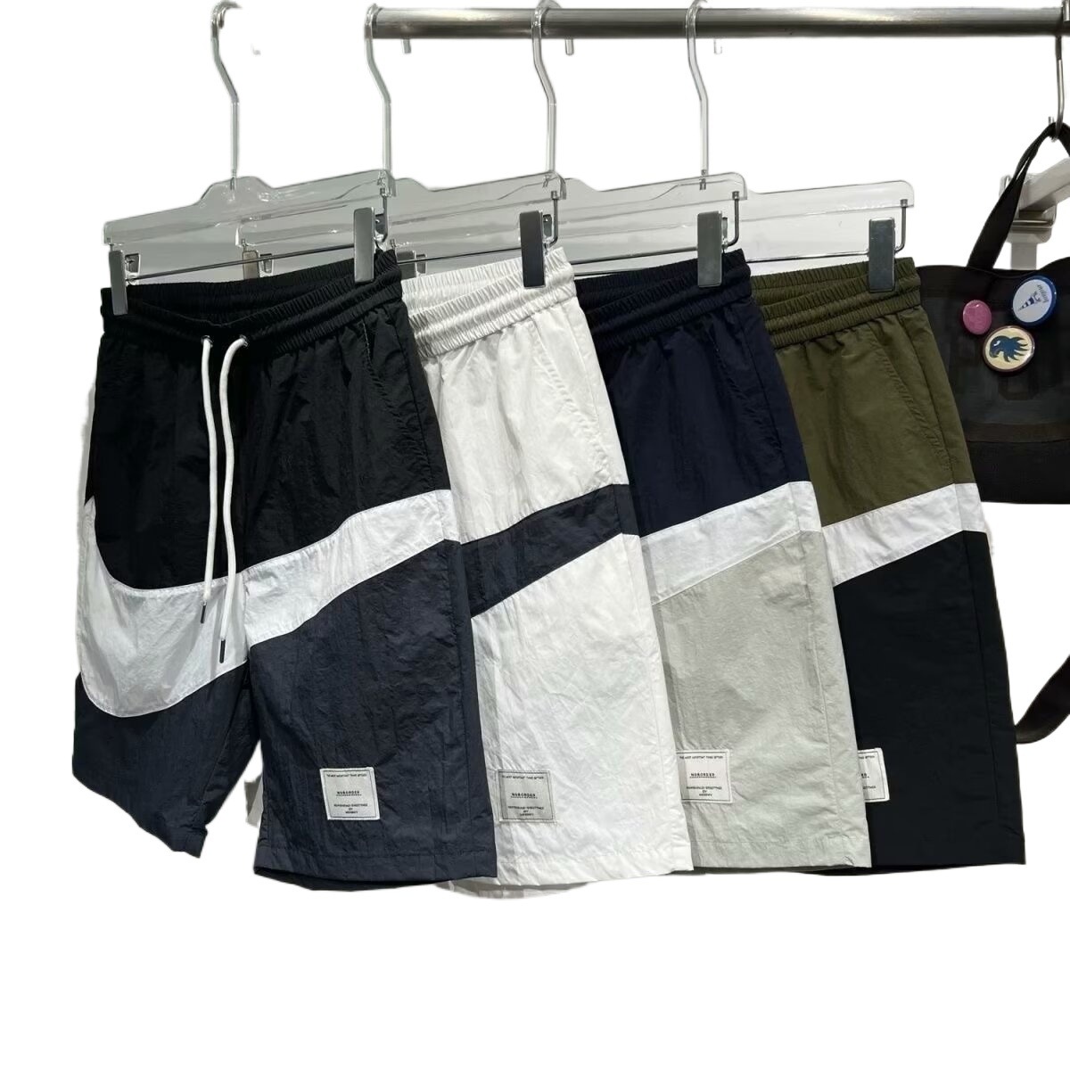 Verano de 2025 nuevos pantalones cortos de trabajo estadounidenses varones de verano de moda japonesa sueltos recto ocio rápido secado cinco puntos